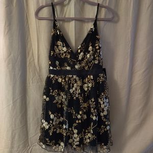 Express dress with embroidered flowers